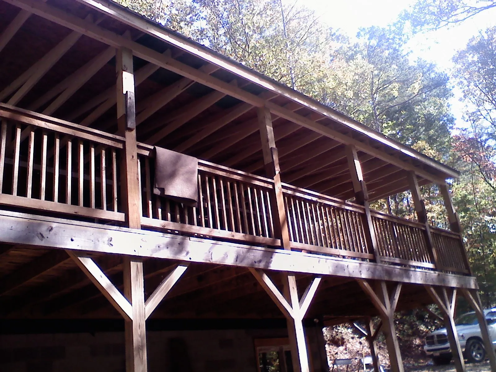 Timber framing under a new elevated porch and deck — Roof Leak Repair in Royse City by Roofing Brothers